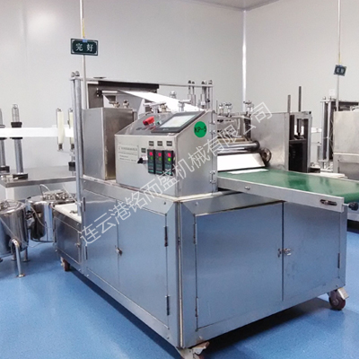 纱布片折叠机的工作原理是什么？